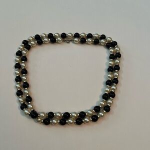 Vintage 1980's String of black and white peals, costume jewelry, synthetic, 22in